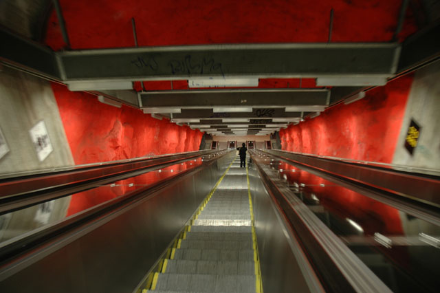 The_escalator_going_down_to_Solna_Centrum_Metro.jpg