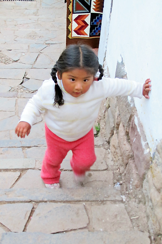 Peruvian kid walking up the steps.jpg