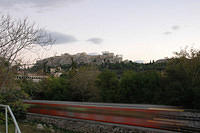 Blurred_metro_with_the_acropolis_001.jpg