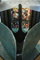 Stained_glass_reflecting_on_a_fountain.jpg