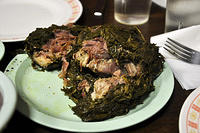Kailua Pig wrapped in a Taro leaves.jpg