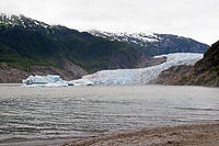 Mendenhall Glacier with icebergs and kayakers