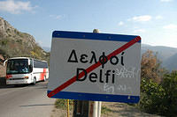 A_tour_bus_from_Athens_enters_Delphi.jpg