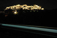 The_metro_at_night_with_the_Acropolis_in_the_background.jpg