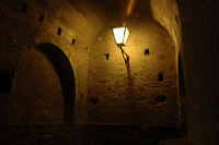 Dimly_lit_tunnels_of_Monemvasia_jpg.jpg