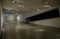 Empty_exhibit_hall_symbolizing_the_lost_potlential_of_millions_killed.jpg