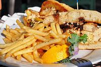 Jamician Jerk Chicken sandwich with Brie Cheese and Carmelized onions.jpg